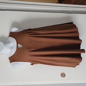 Brown tank top. Has suede feel.  Free flowing and super comfy